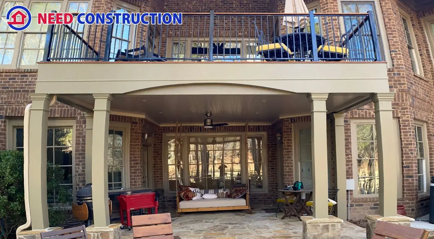 Deckorators composite deck with railing system built by Need Construction